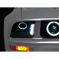 Raxiom 05-09 Ford Mustang w/ Halogen LED Halo Prjctr Headlights-Blk Hsng(Smoked Lens Exclude GT500)