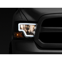 Raxiom 09-18 Dodge RAM 1500 LED Bar Headlights- Black Housing (Clear Lens)