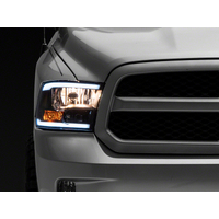 Raxiom 09-18 Dodge RAM 1500/2500/3500 Axial Series Headlights w/ LED Bar- Blk Housing (Clear Lens)