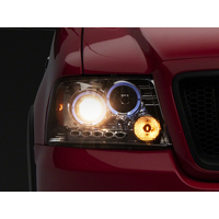Raxiom 04-08 Ford F-150 Dual LED Halo Projector Headlights- Chrome Housing (Clear Lens)
